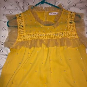 A loose blouse worn once